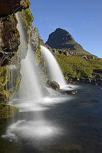 raging waterfalls near mountain thumbnail