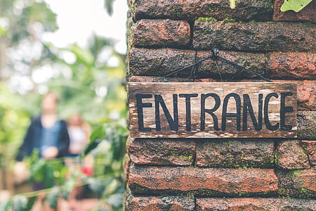 entrance signboard attached on wall thumbnail