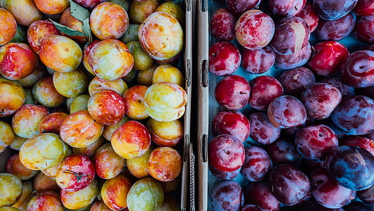 yellow-and-red boxes of plum thumbnail