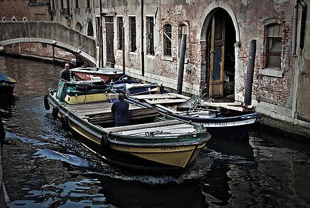 white and black boats on body of water thumbnail