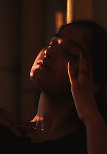 woman closing her eyes thumbnail