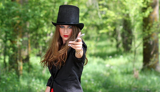 woman wearing black blazer and fedora hat thumbnail