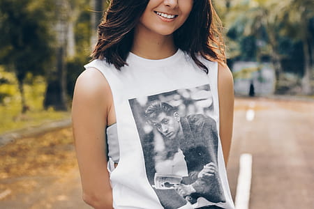 woman wearing white muscle shirt thumbnail