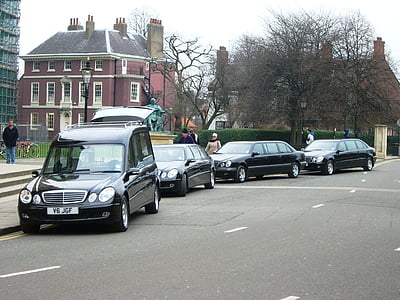 four vehicles parked outside highway thumbnail