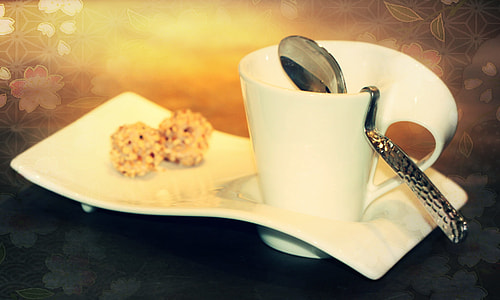 white coffee mug with stainless steel spoon with plate thumbnail