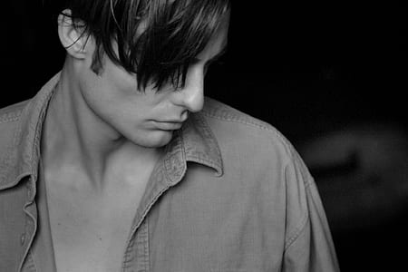 Grayscale Photo Of Man Wearing Collared Shirt thumbnail