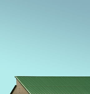 green roof under clear blue sky at daytime thumbnail