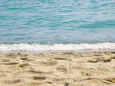 small waves into beach shore thumbnail
