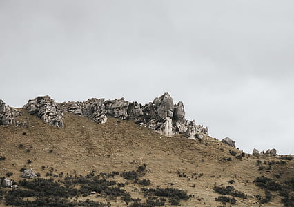 gray mountains under white sky thumbnail