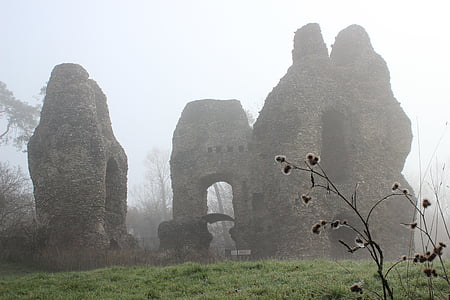 three concrete buildings cover with fog thumbnail