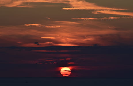 sunset under white clouds thumbnail
