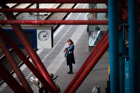 Woman Standing Near Rail Road thumbnail