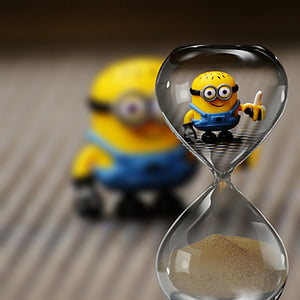 hourglass with minion action figure background thumbnail
