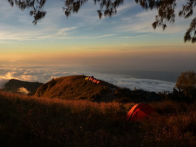 bird's eyeview photo of mountain and bed of clouds thumbnail