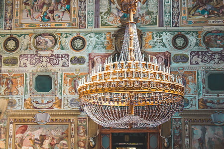 gold-colored clear crystal chandelier closeup photography thumbnail
