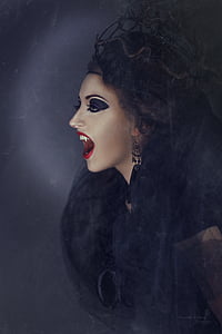 vampire woman wearing black top thumbnail
