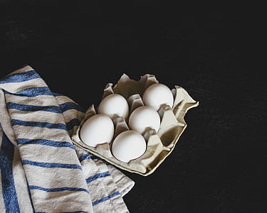 five eggs on tray thumbnail