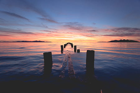 brown post at body of water thumbnail