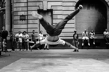 grayscale photography of man falling thumbnail