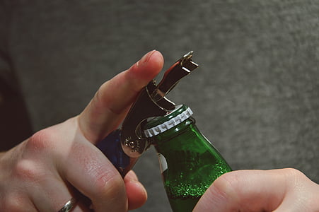 person opening bottle thumbnail