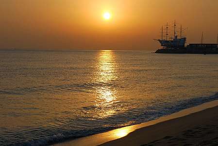 boat on dock during sunset thumbnail