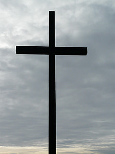 silhouette photography of cross thumbnail