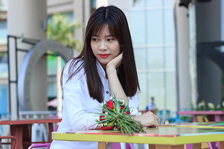 woman wearing white button-up long-sleeved top thumbnail