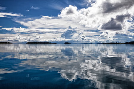 body of water and clouds during nighttime thumbnail