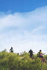 people climbing mountain with bicycles thumbnail
