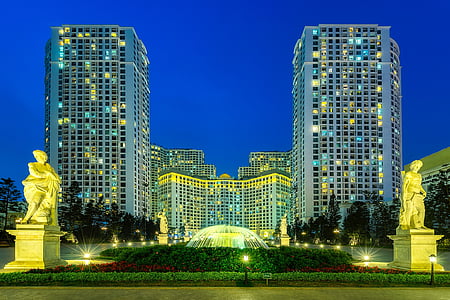 blue and green lightened buildings thumbnail
