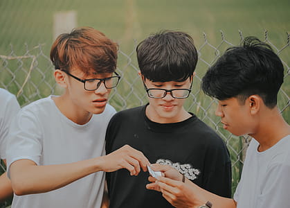 Man Wearing Black Crew-neck Shirt Beside Man Wearing White Crew-neck Shirt thumbnail