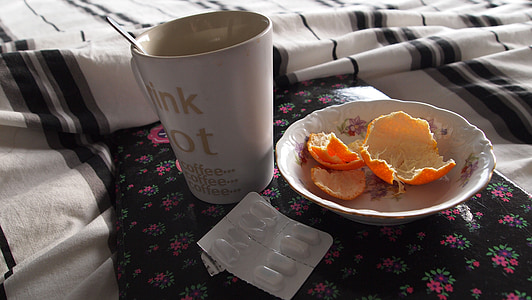 mug beside bowl and blister pack thumbnail