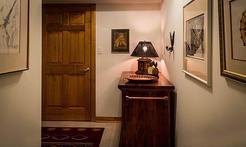 table lamp on wooden end table thumbnail