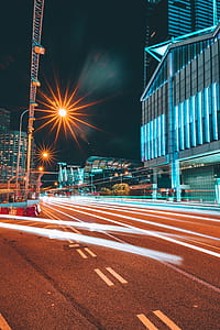 timelapse photography of road with lights at nighttime thumbnail