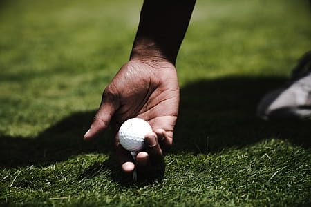 Person Holding Golf Ball thumbnail