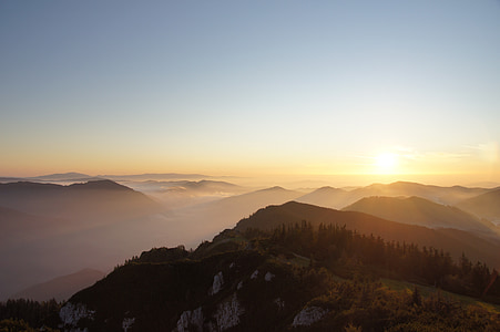 aerial view of mountain with fog during sunrise thumbnail