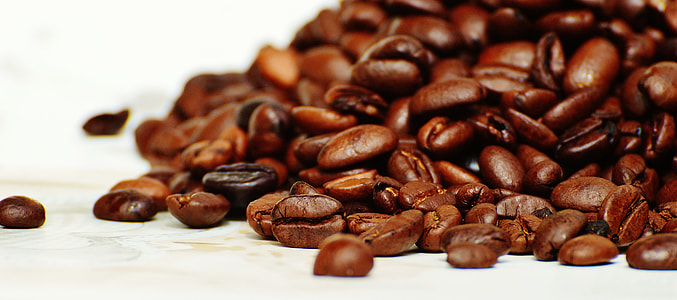 coffee beans on white surface thumbnail