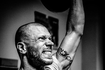 man holding barbell thumbnail