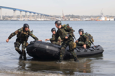 army riding inflatable boat thumbnail