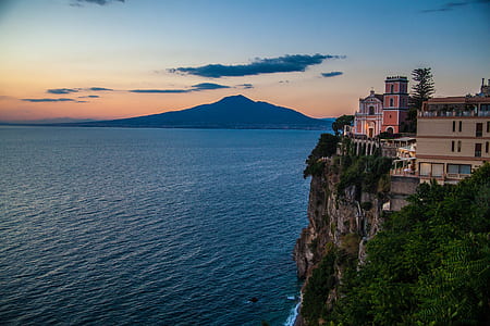 beige houses on cliff thumbnail