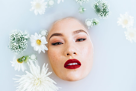 photograph of woman immersed on water thumbnail