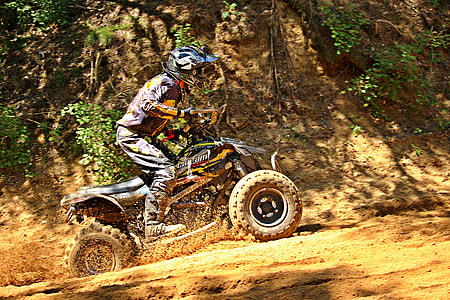 person riding ATV during daytime thumbnail