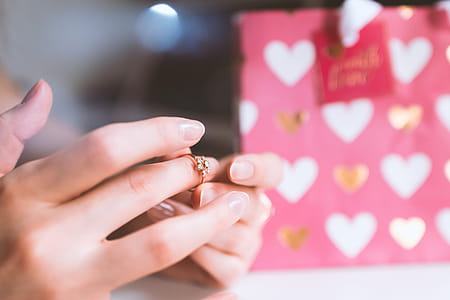 Valentine’s Day, Hands of girl with a ring of love thumbnail