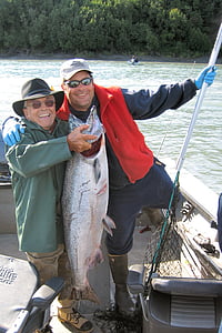 man holding salmon fish thumbnail