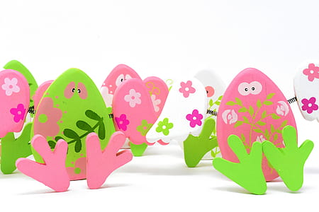 pink and white figurines thumbnail