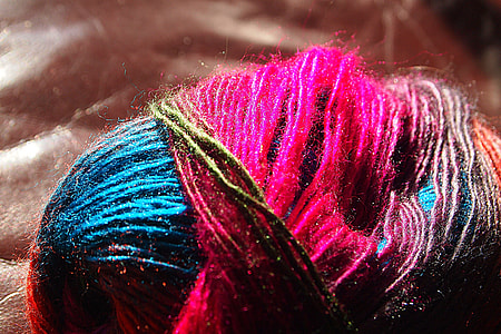 pink and teal yarn thread thumbnail