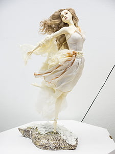woman in gray midi dress figurine thumbnail
