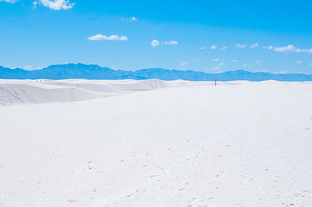 white sand under blue sky during daytime thumbnail