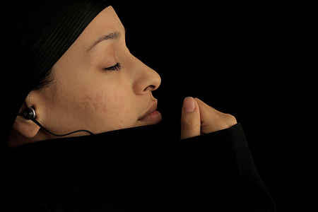 woman wearing black pullover hoodie thumbnail