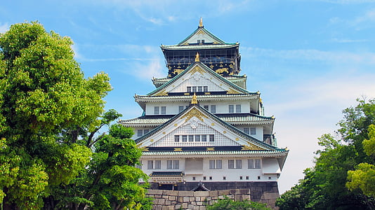 white and gray temple near trees thumbnail